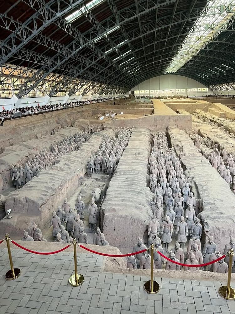 Panoramic view of Terracotta Army Pit 1 exhibition hall in Xi'an, showing thousands of life-sized warrior figures